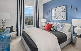 Model bedroom with mountain views at American Fork