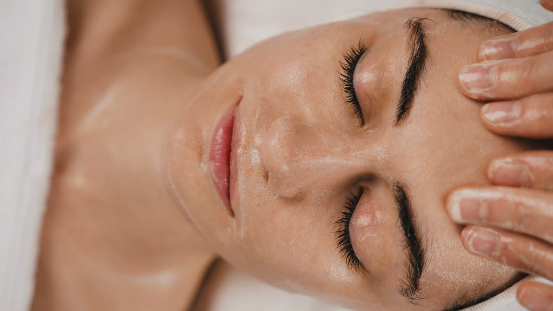 Woman getting a facial in a spa