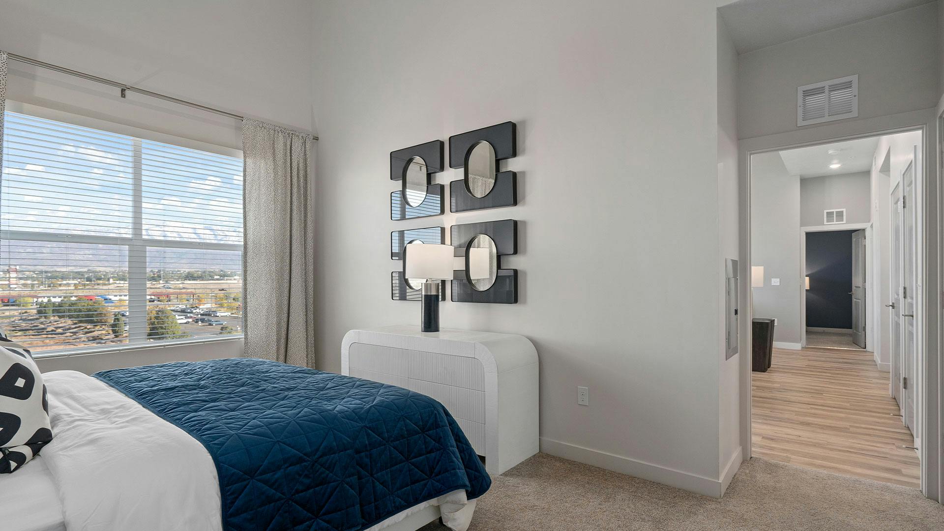 Model apartment bedroom at Ely at American Fork